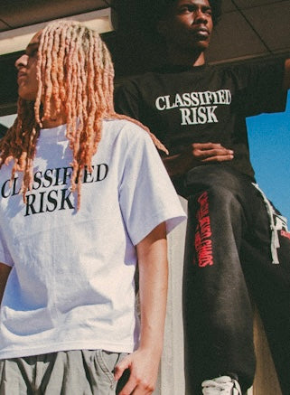 CLASSIFIED RISK TEE